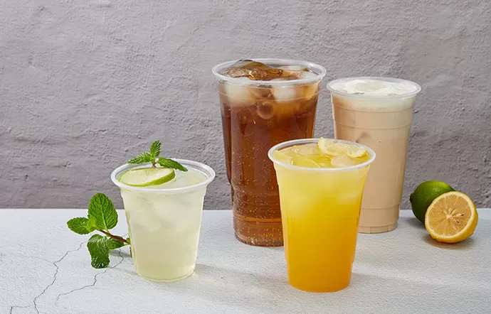 How Do Different Cup Materials Affect Drink Presentation and Durability?