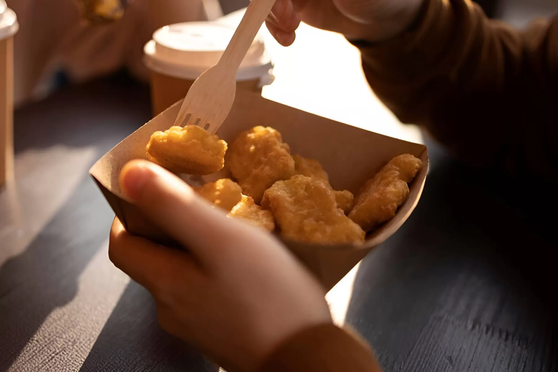 How Do Grease-Resistant Coatings Improve the Performance of Paper Trays?